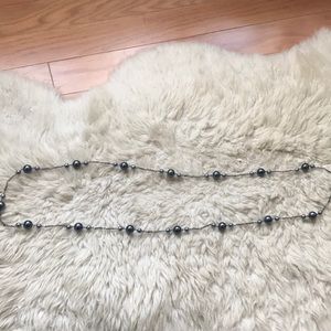 Long grey beaded necklace